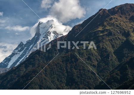 Mt.Machapuchare or Mt.fish tail (6,993 m) the holy mountain in Annapurna region in Nepal. This mountain situated in the Annapurna massif, Its highest peak has never been officially climbed. 127696952