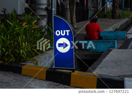 Blue OUT Direction Sign With Right Arrow 127697221