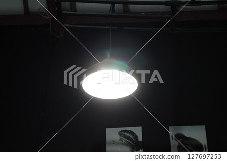 Modern Ceiling Light Fixture in Industrial Interior Modern Ceiling Light Fixture in Industrial Interior 127697253