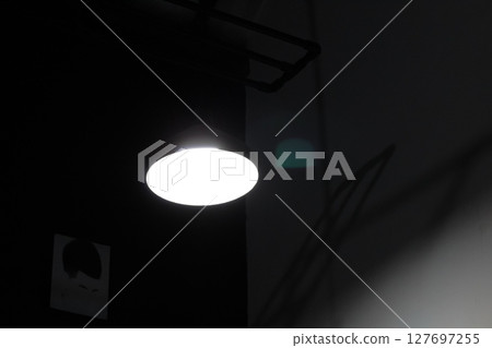Modern Ceiling Light Fixture in Industrial Interior Modern Ceiling Light Fixture in Industrial Interior 127697255
