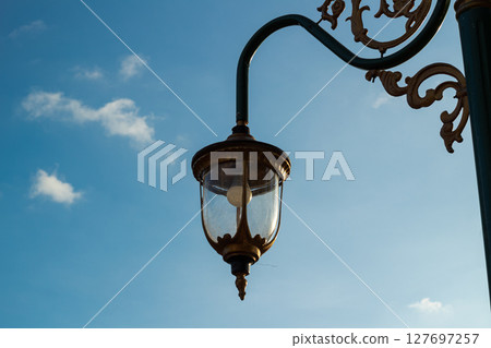 Antique Outdoor Light with Clear Sky 127697257
