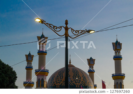 Modern Street Lights Against Mosque at Twilight - Mataram 24 Agustus 2024 127697260