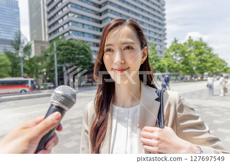 Business woman who is interviewed Business woman who is interviewed 127697549