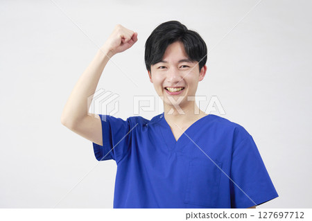 Doctor, nurse, dentist, caregiver, male, fist pump, white background 127697712