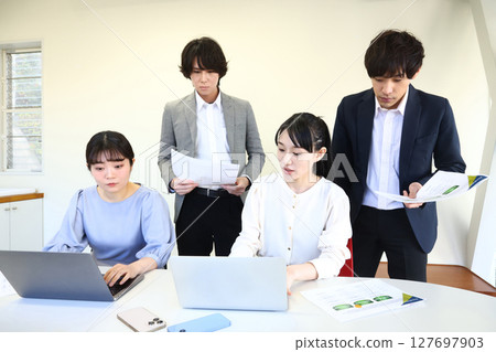 Office worker working in the office Office worker working in the office 127697903
