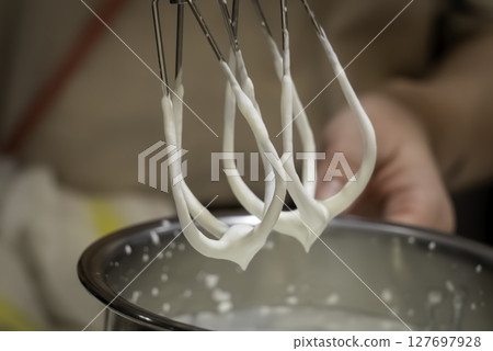 Electric mixer whipped Electric mixer whipped 127697928