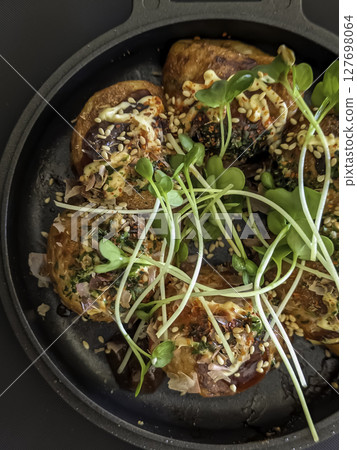 Takoyaki on the iron plate Takoyaki on the iron plate 127698064