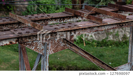 Corroded Steel Detail - Grunge Texture of an Old Metal Bridge Corroded Steel Detail - Grunge Texture of an Old Metal Bridge 127698097