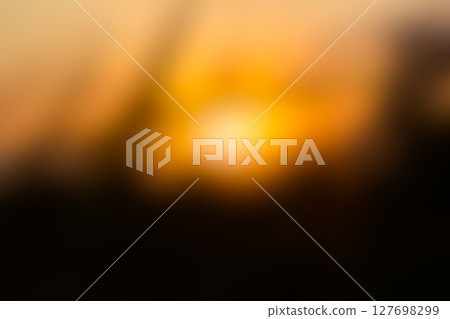 Soft Blurry Background of Sunrise Glow 127698299