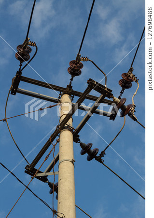 Electrical Wires and Insulators on Utility Pole Electrical Wires and Insulators on Utility Pole 127698488