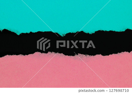 Light blue and pink ripped paper isolated on black background with copy space 127698710
