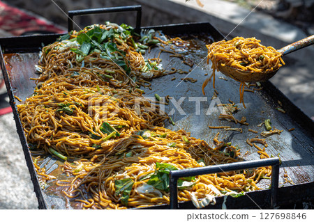 Traditional Indonesian Mie Goreng Street Food Preparation Traditional Indonesian Mie Goreng Street Food Preparation 127698846