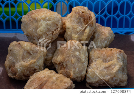 Assortment of Indonesian Fried Snacks at a Street Food Stall Assortment of Indonesian Fried Snacks at a Street Food Stall 127698874