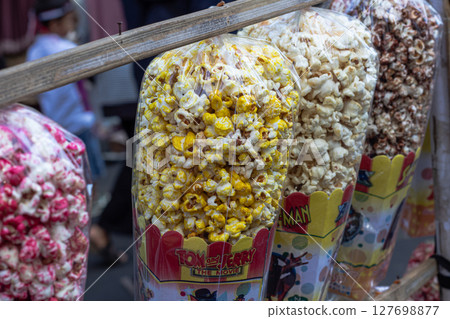 Assorted Popcorn Bags Displayed at a Local Fair at Mataram, Lombok, Indonesia - September 1, 2024 Assorted Popcorn Bags Displayed at a Local Fair at Mataram, Lombok, Indonesia - September 1, 2024 127698877