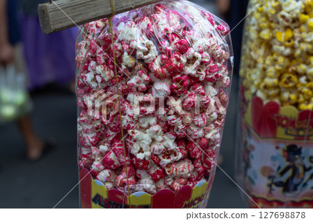 Assorted Popcorn Bags Displayed at a Local Fair at Mataram, Lombok, Indonesia - September 1, 2024 Assorted Popcorn Bags Displayed at a Local Fair at Mataram, Lombok, Indonesia - September 1, 2024 127698878