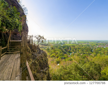 Wooden walkway and green land of "Wat Phu Tok" in northeastern Thailand Wat Phu Tok, Thailand 127700786