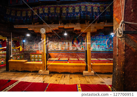 Fine art on the wall in Thiksey Monastery 127700951
