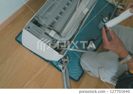 Air conditioner relocation drain hose left piping Air conditioner relocation drain hose left piping 127701640