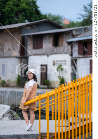 Portrait asian woman tourist Traveler walking and with travel at Mae Kha canal New Landmark It is a major tourist is Public places attraction Chiang Mai City,Thailand,travel and leisure concept day Portrait asian woman tourist Traveler walking and with travel at Mae Kha canal New Landmark It is a major tourist is Public places attraction Chiang Mai City,Thailand,travel and leisure concept day 127701721