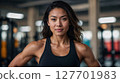 AI-generated image of a woman smiling at the gym 127701983