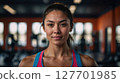 AI-generated image of a woman smiling at the gym 127701985