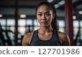 AI-generated image of a woman smiling at the gym 127701986