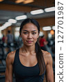 AI-generated image of a woman smiling at the gym 127701987