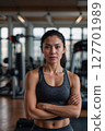 AI-generated image of a woman smiling at the gym 127701989