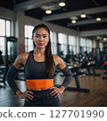 AI-generated image of a woman smiling at the gym 127701990