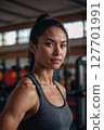 AI-generated image of a woman smiling at the gym 127701991
