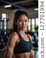 AI-generated image of a woman smiling at the gym 127701994