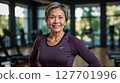 Senior woman smiling at the gym "AI generated image" 127701996