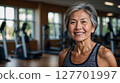 Senior woman smiling at the gym "AI generated image" 127701997