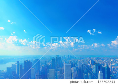 湛藍的天空和鳥瞰的城市景觀（高樓大樓和商業區） 127702253