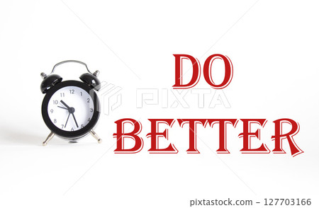 Do better symbol. Beautiful white background with alarm clock. Business and Do better concept. Copy space. Do better symbol. Beautiful white background with alarm clock. Business and Do better concept. Copy space. 127703166