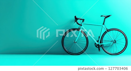 Modern blue bicycle leaning against a vibrant turquoise wall in a minimalist setting showcasing contemporary design and style Modern blue bicycle leaning against a vibrant turquoise wall in a minimalist setting showcasing contemporary design and style 127703406
