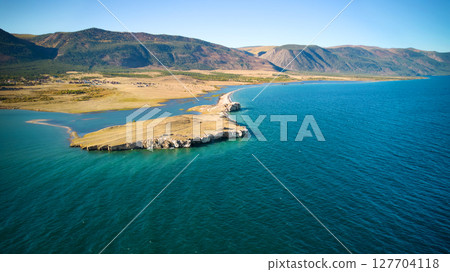 Lake Baikal from the air. View of the bay near the village of Kurma. 127704118