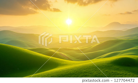Epic fantasy landscape of vibrant green rolling hills at sunset, beautiful and surreal nature scene with amazing golden light 127704472