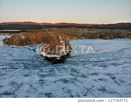 Aerial view of the village of Khuzhir, Olkhon Island, Cape Burkhan or Shamanka Rock. Aerial view of the village of Khuzhir, Olkhon Island, Cape Burkhan or Shamanka Rock. 127704771