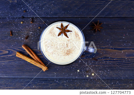 A cup of masala tea. Traditional Indian tea drink with milk and spices. 127704773