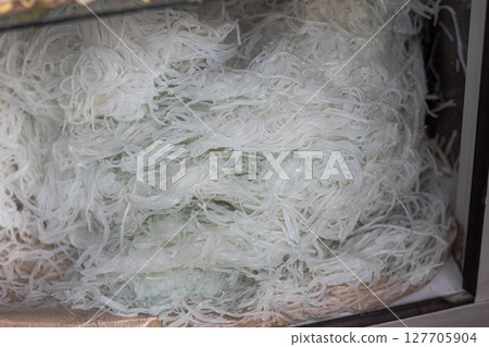 Pile of White Rice Noodles for Traditional Cuisine Pile of White Rice Noodles for Traditional Cuisine 127705904