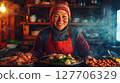 Cooking traditional meals in a cozy kitchen with warm lighting and a joyful chef preparing delicious dishes 127706329