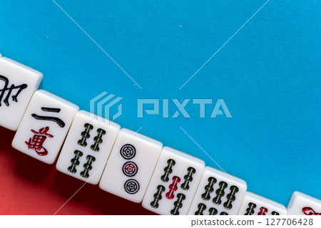 mahjong tiles lined up 127706428