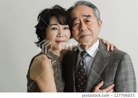 An elegant moment for a middle-aged couple 127706855
