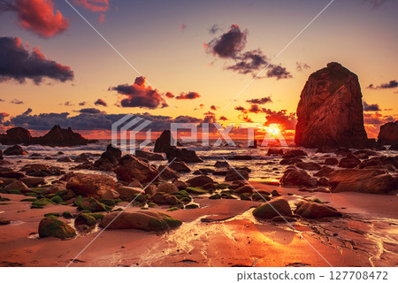 Praia da Ursa beach, Sintra-Cascais Natural Park, Portugal, cliffs in the sea at sunset Praia da Ursa beach, Sintra-Cascais Natural Park, Portugal, cliffs in the sea at sunset 127708472