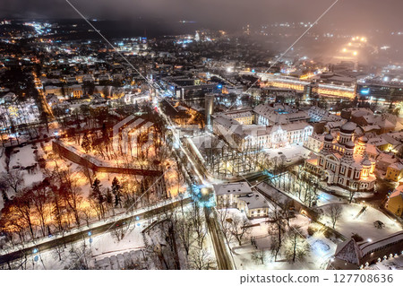 Aerial night View of Tallinn in winter with Alexander Nevsky Cathedral, roofs with snow, Christmas mood 127708636