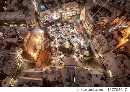 Aerial night View of Tallinn with the Town Hall Square in winter, roofs with snow, Christmas mood Aerial night View of Tallinn with the Town Hall Square in winter, roofs with snow, Christmas mood 127708647