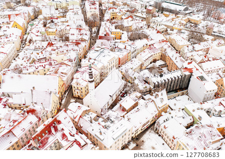 Aerial View of Tallinn in winter, roofs are covered with snow, Christmas mood 127708683