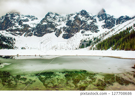 Frozen Lake Morskie Oko or Sea Eye Lake in Poland at Winter. 127708686