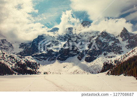 Frozen Lake Morskie Oko or Sea Eye Lake in Poland at Winter. Frozen Lake Morskie Oko or Sea Eye Lake in Poland at Winter. 127708687
